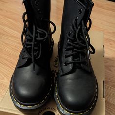 They Are Bad-Ass And Og. Never Wore Them, They've Just Been Sitting Pretty All Boxed On My Shelf For 3 Years. Please Take Them And Make Them Look Goood :) Website Description: A Classic Dr. Martens Silhouette, The 8-Eye 1460 Greasy Is All About The Leather: A Matte Black With A Waxy, Oily Feel. Built On Top Of A Rugged Yet Refined Sole, This Boot Is Premium Comfort Disguised As Sleek Style. Black Lace-up Martin Boots In Grunge Style, Black Lace-up Martin Boots Grunge Style, Rugged Black Lace-up Martin Boots, 1460 Doc Martens, Doc Martens Black, Black Lace Boots, Womens Dr. Martens 1460 8-eye Patent Boot - Black, Dr Martens Womens, Doc Martens Boots