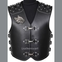 New Men's Motorbike Vest, Wolf Embroided Vest, Motorcycle Vest, Biker Vest, Black 3MM Thick leather vest Men's Item Feature New with tags Genuine Cowhide Letaher 3MM Thick Leather Soft Silk Lining  Wolf Embossed On Vest Front and Back Original Brass Material Heavy Duty Clasps  Will be best leather Vest in your wardrobe    We will Deliver This item Same as Shown in Picture Its Our Grantee Buy With Confidence     We can Offer you customized size/ customized design and Color Changes You can also ask us for Color change and custom measurements. Custom Size: Made On Your Personalization Demand - Made-to-Measure, based on your provided measurements Personalized item Policy   We don't accept the return of personalized item if you want any personalization on your product we will charge you extra c Moto Style Black Vest For Biker Events, Sleeveless Black Biker Jacket For Biker Events, Moto Style Sleeveless Vest For Biker Events, Black Moto Vest For Biker Events, Sleeveless Biker Leather Jacket For Biker Events, Fitted Biker Vest For Biker Events, Moto Vest For Biker Events, Gothic Leather Biker Jacket For Biker Events, Gothic Leather Biker Jacket For Events