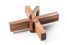 a wooden cross on a white background