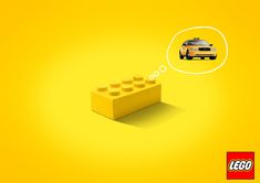 a yellow background with a lego car and a thought bubble in the shape of a brick