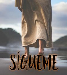 a person walking across a beach with the words siquene on it's side