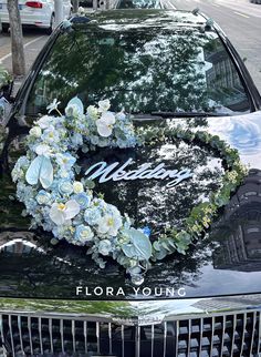 a car with flowers on the hood