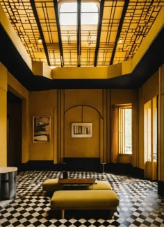 a large room with black and white checkered flooring