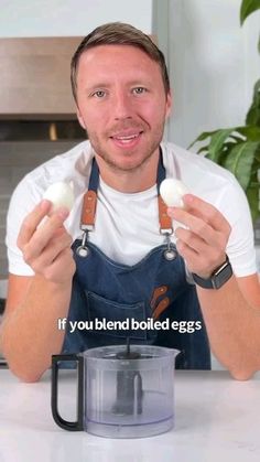 a man holding two eggs in front of a blender with the words if you blend boiled eggs