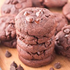 chocolate cookies are stacked on top of each other