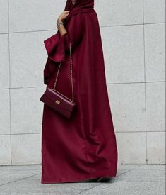 Soft satin crimson coat style red Abaya with classical cut design with elegant buttons Perfect choice for daily outings or family gatherings.FREE HIJAB INCLUDED Burgundy Abaya Outfit, Hijabs Holiday Outfit, Red Abaya Outfit, Elegant Solid Color Abaya For Eid, Elegant Floor-length Solid Abaya, Formal Maxi-length Abaya For Fall, Eid Evening Solid Color Abaya, Elegant Solid Abaya For Fall, Elegant Solid Color Abaya For Fall