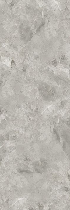 a white marble textured wall with grey veiners