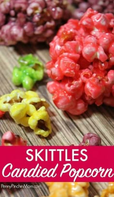 skittles candy candied popcorn on a wooden table with text overlay that reads skittles candied popcorn