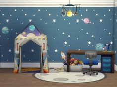 a child's room decorated in blue and white with stars on the wall, space theme