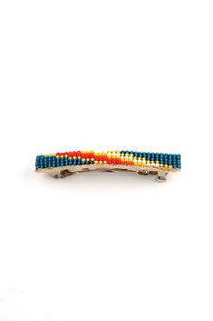 This Narrow Navajo Beaded Barrette is perfect for children or adults. Five hundred years ago, Europeans brought glass beads to the New World. They quickly became part of American Indian culture. Today glass beads, particularly fine seed beads, are the primary materials for the traditional beadwork of many tribes. This beautiful Navajo beaded barrette is covered with hundreds of tiny colorful glass seed beads in traditional patterns. Very few Native Americans are doing beadwork today and the piec Beaded Barrettes, Diy Western Jewelry, Beaded Hair Combs, Bead Loom Kits, Silversmithing Jewelry, Native American Beadwork Patterns, Bead Hair Accessories, Bead Loom Designs, Cross Stitch Fonts