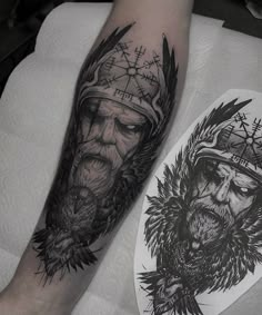 a man's leg with tattoos on it and an image of a person wearing a hat