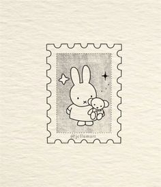 a stamp with a bunny holding a teddy bear