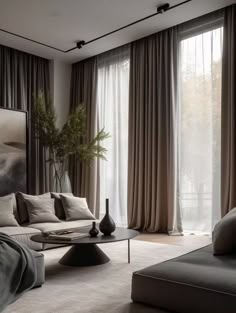 a living room filled with lots of furniture next to a window covered in drapes