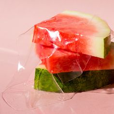 slices of watermelon and cucumber wrapped in plastic