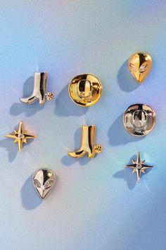 Gold and silver space cowgirl inspired stud earrings. Tell Me About It Stud, Mismatched Earrings, Tell Me, Silver Gold, Gold Tones, Stud Earrings, Silver, Gold