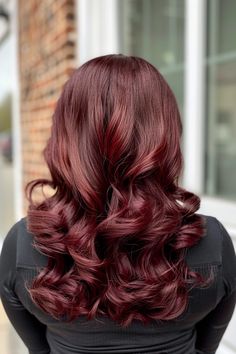 Meet the chic burgundy hair color trend you’ll want to try immediately. From the rich mahogany hair color you see here to luxurious bordeaux shades, find your next hair inspiration here! Click to check out all the colors now and pin your favorites! Mahogany Hair Color, Kids Hair Color