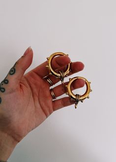 Very cool and quite heavy ear weights. Sold as a pair Weight: 27g each  Suitable for 5mm+ stretched ears  45mmx40mm in size  Available in gold or silver Unique Gold Metal Cartilage Earrings, Gold Hoop Metal Piercings, Edgy Gold Jewelry For Festivals, Gold Punk Pierced Jewelry, Punk Gold Pierced Jewelry, Gold Punk Single Earring, Gold Punk Style Single Earring, Punk Style Gold Single Earring, Gold Single Earring Punk Style