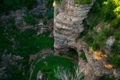 an aerial view of the cliffs and trees