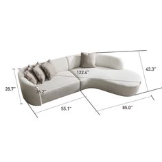 a sectional couch with pillows and measurements