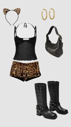 a woman's outfit with leopard print shorts and boots