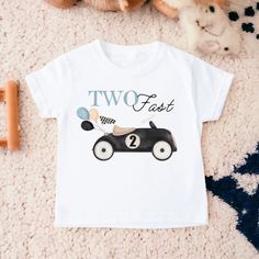 two fast cars birthday shirt with number 2 on it and teddy bear next to it