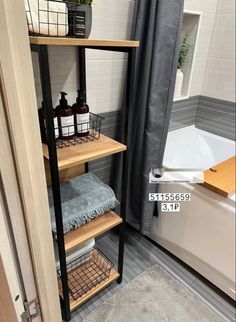 the bathroom is clean and ready to be used as a storage area for towels or other items