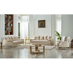 a living room filled with furniture and white walls