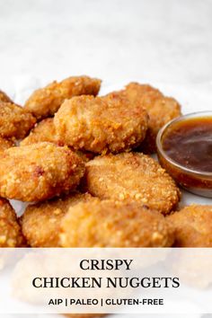 crispy chicken nuggets with dipping sauce on the side and text overlay reads crispy chicken nuggets