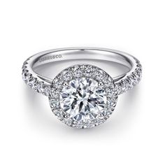 a diamond engagement ring with an halo setting