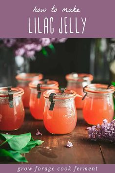 how to make lilac jelly in mason jars on a wooden table with purple flowers