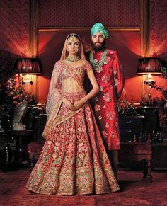 This red color bridal lehenga is in silk velvet embroidered with thread and zardozi work. Dupattas atr in gold color net fabric with embroidered edges and sequins butties inside. Blouse is also fully embroidered. Ritu Kumar Lehenga, Sabyasachi Bridal, Sabyasachi Mukherjee, Sabyasachi Bride, Sabyasachi Lehenga, Ritu Kumar, Anita Dongre, Indian Bridal Lehenga, Bridal Lehenga Red