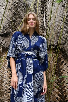 The kimono has a loose swing shape for an easy, flowy fit making it extremely comfortable to wear. The palm leaf  Print covers the entire front and back panel and is piped in a lovely contrast colour. Use the belt included with the dress if you prefer a more fitted look. Our kimono comes in 4 sizes and 3 lengths, Size: *SMALL will fit size UK 8-12 /US 4-8 . Width is 120cm. Will fit up to a bust measurement 92 cm to allow for a 15 cm each side overlap *REGULAR will fit size UK 14-16/US 10-12. Wid Beach Kimono With Belted Kimono Sleeves, Belted Kimono With Kimono Sleeves For Vacation, Summer Kimono With Belted Kimono Sleeves, Summer Kimono With Belted Waist And Kimono Sleeves, Belted Kimono For Beach, Beach Kimono With Belt, Summer Beach Kimono With Belt, Summer V-neck Belted Kimono, Palm Leaf Kimono