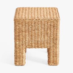 a small wicker stool on a white background