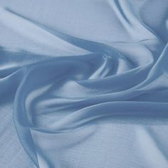 This lightweight and flowing fabric is made from a luxurious chiffon. It's wrinkle-resistant and offers impeccable drapes. With a matte-like finish and soft-touch feel, cationic chiffon provides outstanding comfort and a timeless look. WOVEN Contents: 100% POLYESTER Weight-Gr/Sqm: 53.5711 Width: 58/60" Country of origin: KOREA Size: 1 YARD.  Color: Blue. Easter Backdrops, Draping Fabric, Festival Skirts, Mint And Navy, Green Baby, Coral Blue, Candy Buffet, Creative Hobbies, Aqua Green