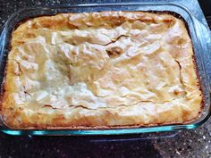 a casserole in a glass dish on a table