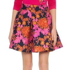 A Bright Floral Zac Posen Miniskirt With A Flirty, Pleated Silhouette. On-Seam Hip Pockets. Hidden Back Zip. Lined. Fabric: Mid-Weight Brocade. 90% Polyester/10% Polyamide. Dry Clean. Measurements Length: 18in / 46cm Measurements From Size 6 Spring Silk A-line Skirt, Pink A-line Bottoms For Party, Silk Full Skirt With Floral Print, Feminine Pink A-line Skirt, Pink A-line Pleated Skirt, Chic Pink Skirt For Cocktail, Silk A-line Skirt, Flared Silk Skirt, Pink Silk Pleated Skirt