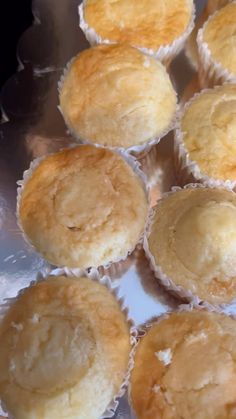 several muffins sitting on top of a metal pan