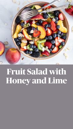 healthy and delicious fruit salad with honey, blueberries, strawberries, peaches, apples, almonds