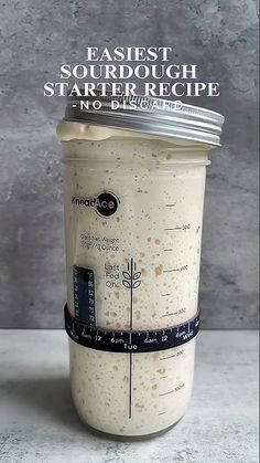 an image of a smoothie in a cup with measuring tape around it and the words easy sourdough starter recipe