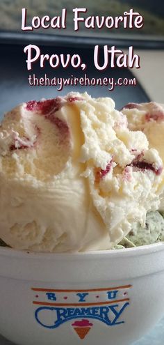 a bowl filled with ice cream sitting on top of a table