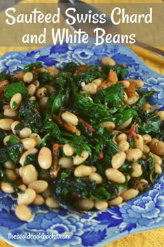 sauteed swiss chard and white beans on a blue plate