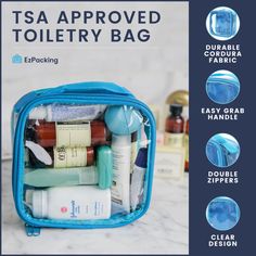 a blue bag filled with toiletries and personal care items on top of a marble counter