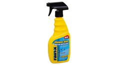 a bottle of yellow cleaner on a white background