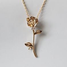 14K Rose Diamond Necklace $360.00 USD 14K Yellow Gold16$360.00 USD 14K Yellow Gold18$360.00 USD 14K Rose Gold16$360.00 USD 14K Rose Gold18$360.00 USD 14K White Gold16$360.00 USD 14K White Gold18$360.00 USD Ask us a question Name Email Phone Number Message PHOTOS ON INSTAGRAM A delicate rose hangs on a fine 14k solid gold filled chainembellished with a 1.8mm natural diamondMaking it a dainty piece for everyday wearThe model is wearing an 18chainThis necklace is designed and made in NYC14k solid Rose Diamond Necklace, Rose Necklace Gold, Gold Rose Necklace, Rose Gold Accessories, Rose Pendant Necklace, Rose Diamond, Indian Jewellery Design Earrings, Gold Rings Fashion