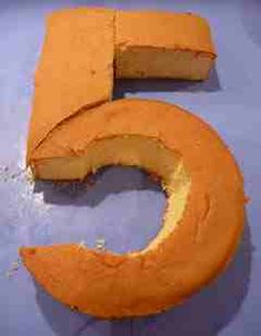 a cake that has been cut into the shape of the number five on top of it