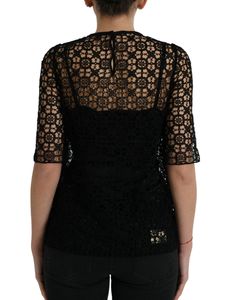 Floral lace design. Made with a premium cotton and silk blend. A truly versatile piece that transitions seamlessly from a day at the office to an evening affair. Material: 95% Cotton, 5% Silk Lining: 76% Silk, 16% Cotton, 4% Elastane, 4% Nylon Color: Black Country of origin: Italy Luxury Blouse With Lace Trim, Elegant Short Sleeve Lace Top For Work, Elegant Evening Lace Top With Short Sleeves, Fitted Short Sleeve Lace Top For Work, Elegant Short Sleeve Lace Top For Evening, Formal Lace Patchwork Blouse, Elegant Fitted Tops With Crochet Lace, Elegant Party Top With Crochet Lace, Fitted Lace Patchwork Blouse For Work