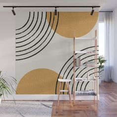 an abstract wall mural in a living room