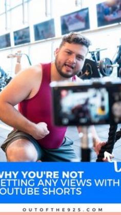 a man squatting down in front of a camera with the words, why you're not getting any views with youtube shorts?