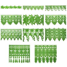 green paper cutouts with intricate designs and fringes on each side, all in different sizes