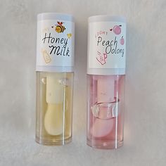 2 Brand New Clear Lip Gloss With Wand Applicators. Peach Oolong And Honey Milk Flavors. Boxes Included. Bubble Tea Lip Gloss, Makeup Products Lip Gloss, Honey Milk Lip Oil, Best Lip Gloss For Brown Skin, Cute Lip Gloss Ideas, Preppy Makeup Brands, Recommended Makeup Products, Cute Lip Gloss Aesthetic, Cute Lip Products